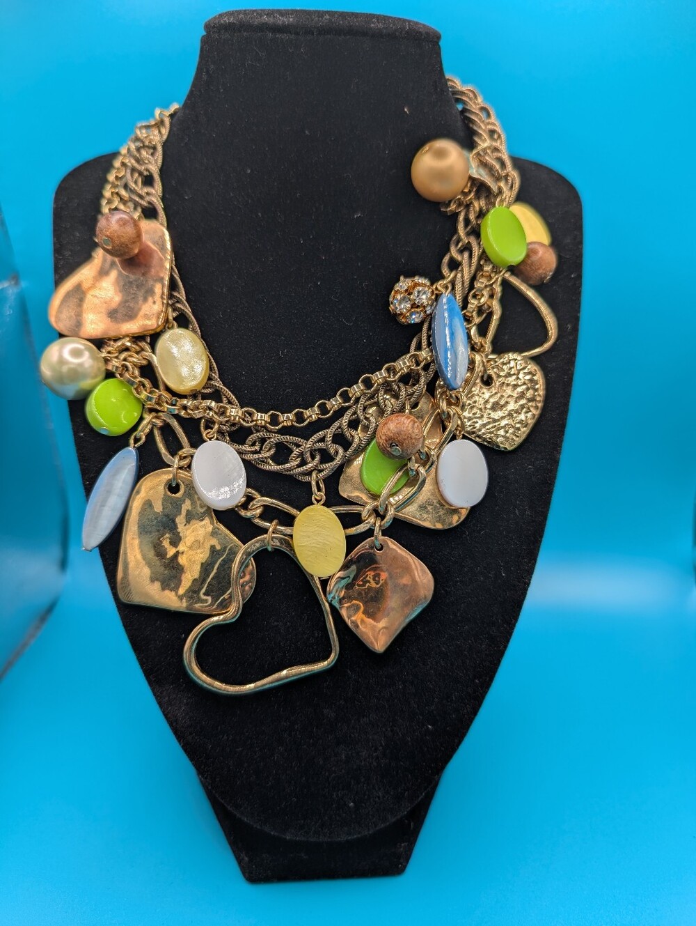 Gold Multi-Heart Charm Statement Necklace with Green and Blue Accents